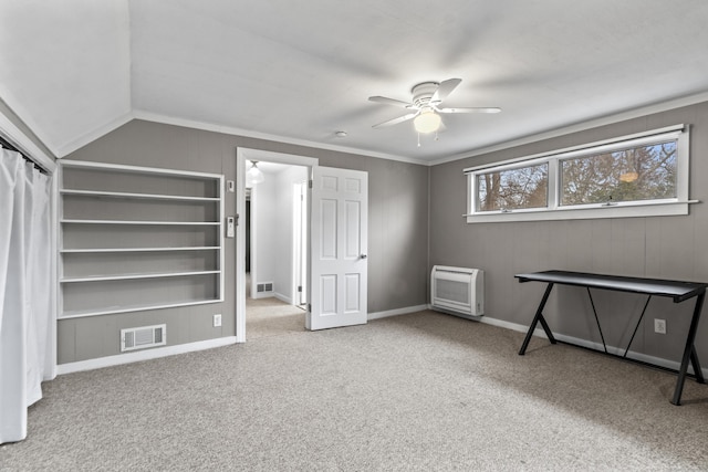 bedroom featuring light carpet, crown molding, lofted ceiling, and ceiling fan