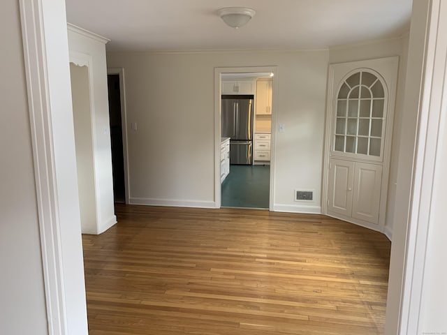 empty room featuring light hardwood / wood-style floors