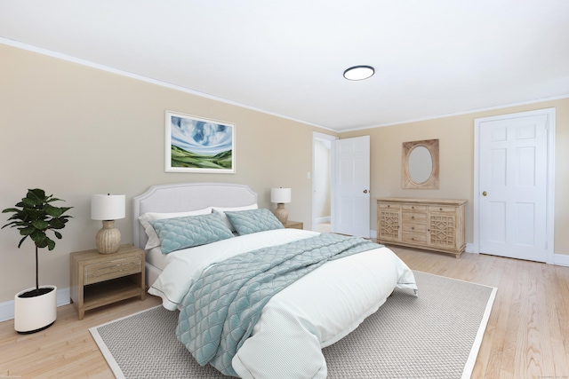 57 Saint James St, West Hartford, CT 06119 - bedroom featuring light wood-style floors, crown molding, and baseboards