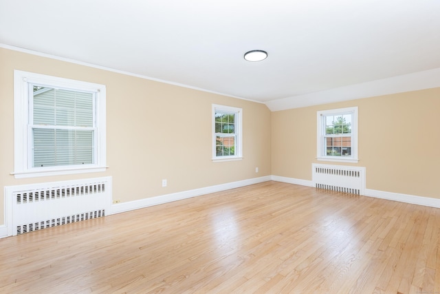 57 Saint James St, West Hartford, CT 06119 - spare room with radiator, ornamental molding, wood finished floors, and baseboards
