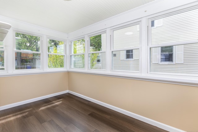 57 Saint James St, West Hartford, CT 06119 - unfurnished sunroom featuring baseboards, wood finished floors, and plenty of natural light