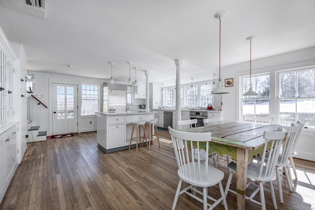 9 Mallory Brook Rd, Washington, CT 06793 - dining space with dark wood-style flooring and baseboards