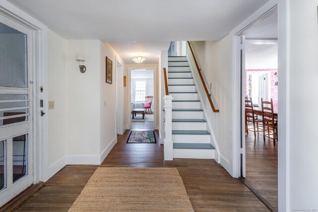 9 Mallory Brook Rd, Washington, CT 06793 - entrance foyer with stairway, dark wood-style floors, and baseboards