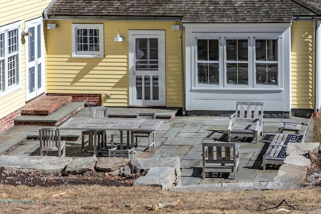 rear view of house featuring a patio