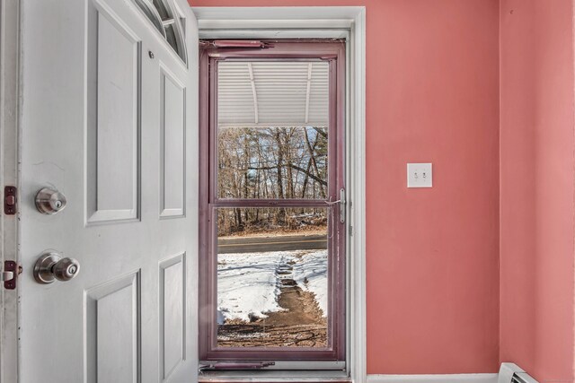 doorway with a baseboard radiator