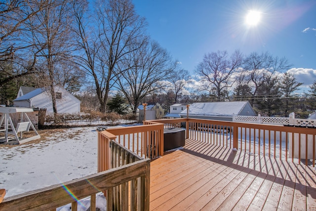 view of snow covered deck