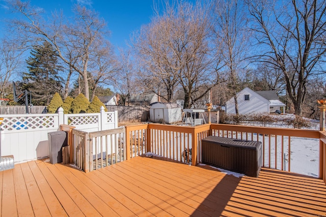 wooden deck with a storage unit