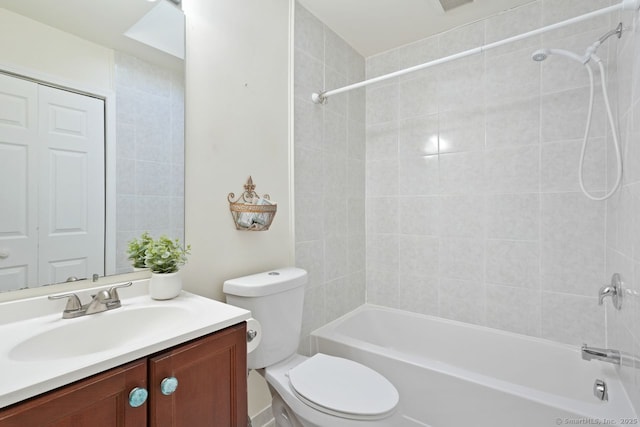 full bath with vanity, toilet, and shower / washtub combination