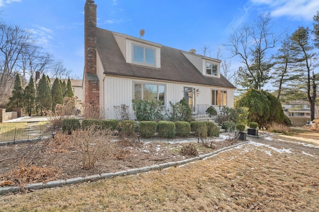 view of new england style home