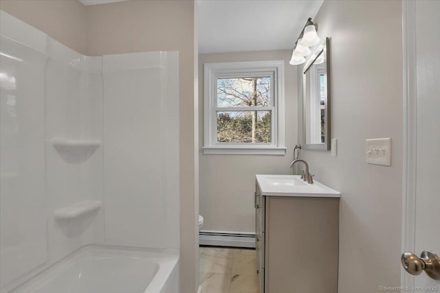 full bathroom with shower / tub combination, vanity, baseboard heating, and toilet