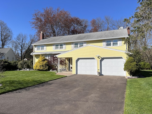 view of front facade with a front lawn