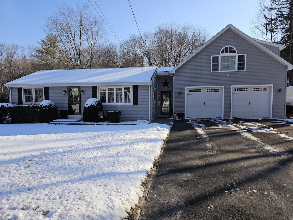 view of front of home with a garage