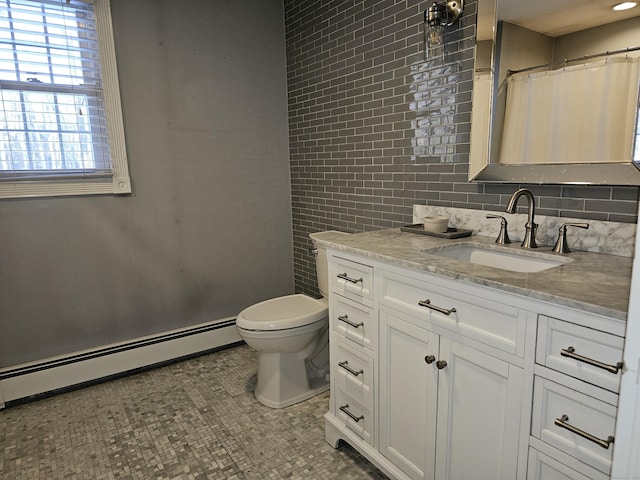 bathroom featuring curtained shower, vanity, decorative backsplash, a baseboard radiator, and toilet