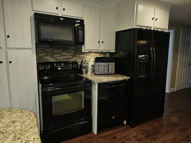 kitchen featuring tasteful backsplash, black appliances, dark hardwood / wood-style flooring, light stone countertops, and white cabinets
