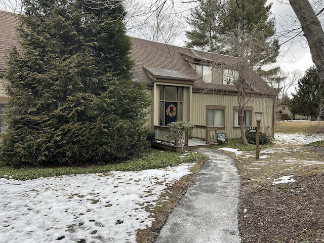 view of front of property with a shingled roof