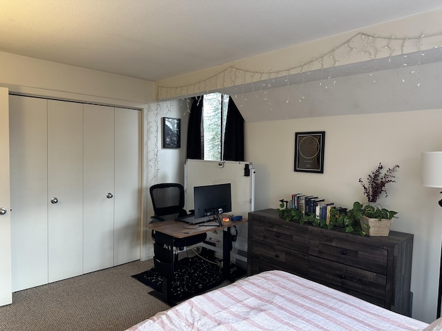 bedroom with carpet and a closet