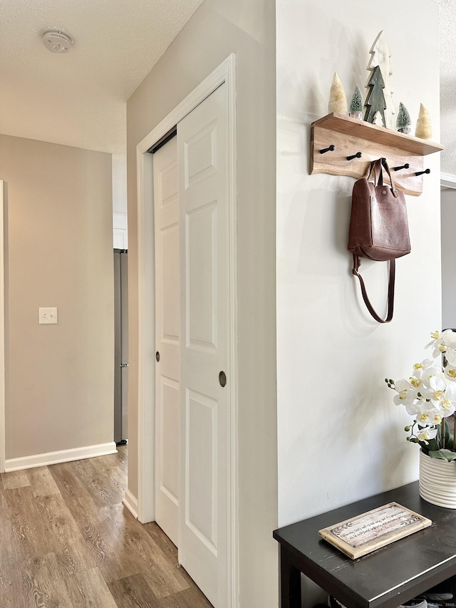 hall featuring light wood-type flooring