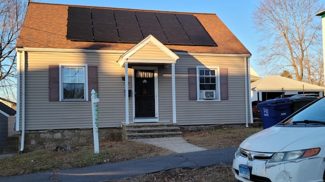 view of front of house with solar panels