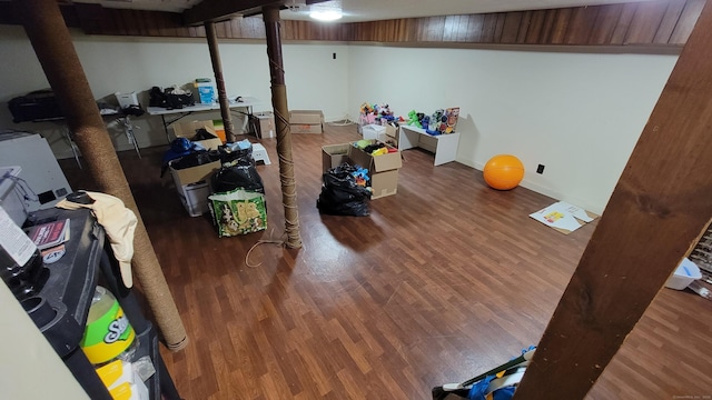 basement with wood-type flooring