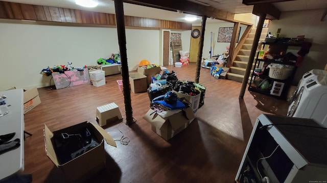 basement with hardwood / wood-style flooring