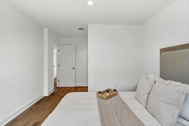 bedroom featuring wood-type flooring