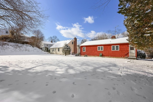 view of snow covered property