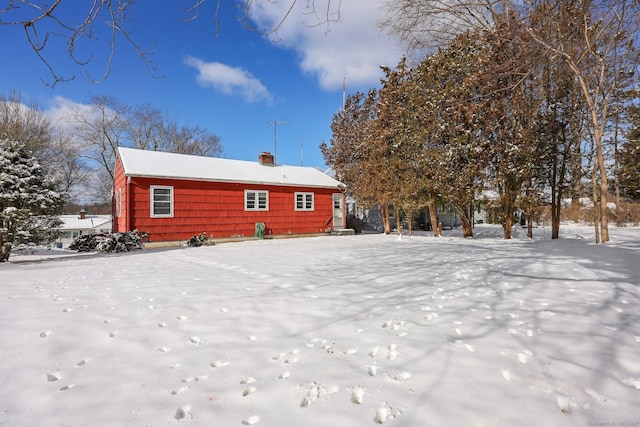 view of snow covered house