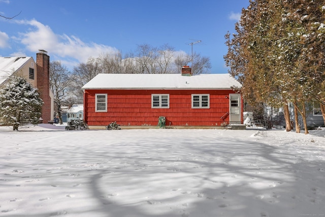 view of snow covered house