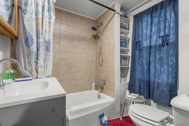 full bathroom with shower / tub combo with curtain, vanity, and toilet