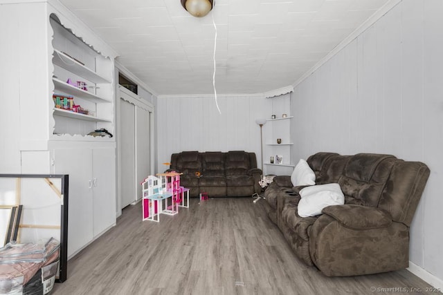 living room with light hardwood / wood-style flooring