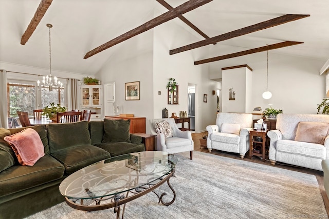 living room featuring wood-type flooring, high vaulted ceiling, a notable chandelier, and beam ceiling