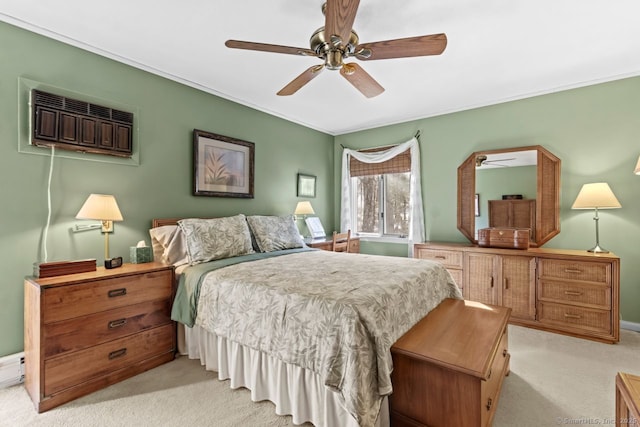 carpeted bedroom featuring crown molding, a wall mounted air conditioner, and ceiling fan