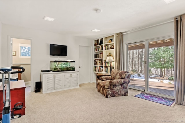 sitting room with light colored carpet