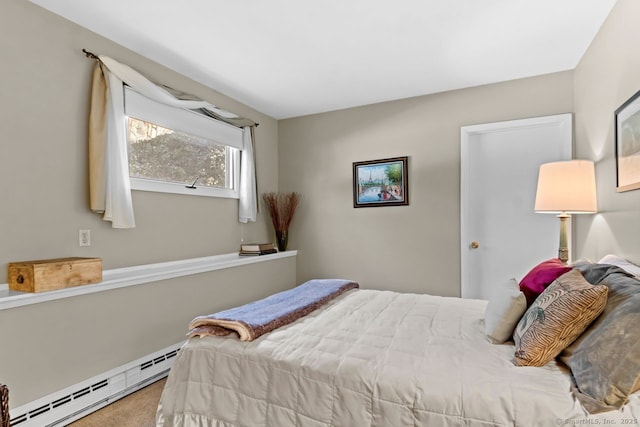 bedroom featuring a baseboard radiator and carpet flooring