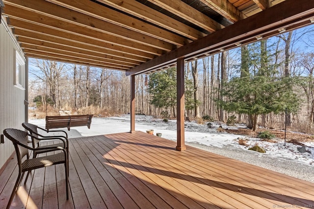 view of snow covered deck