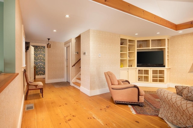 living room with light hardwood / wood-style floors