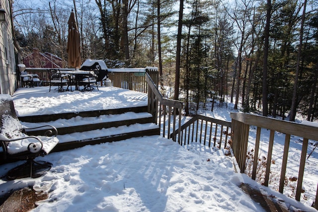 view of snow covered deck