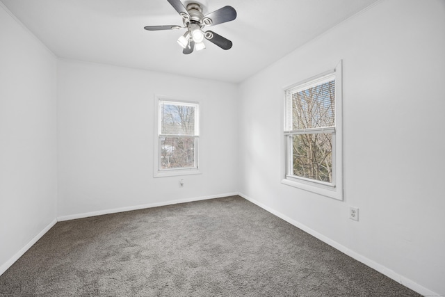 empty room with carpet floors and ceiling fan