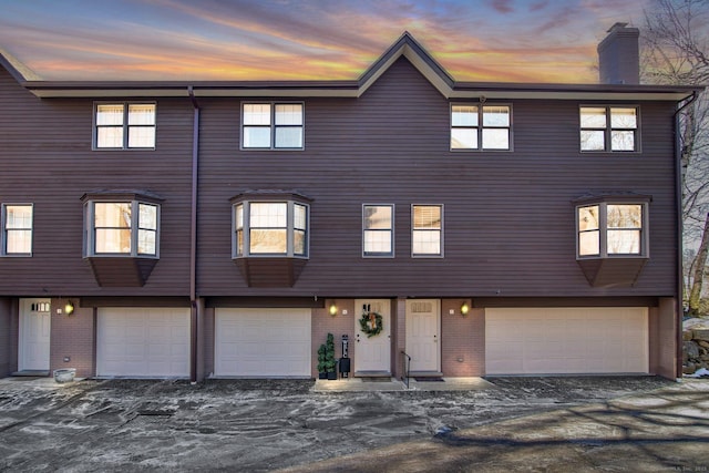 view of front of property with a garage