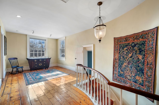 hallway with wood-type flooring