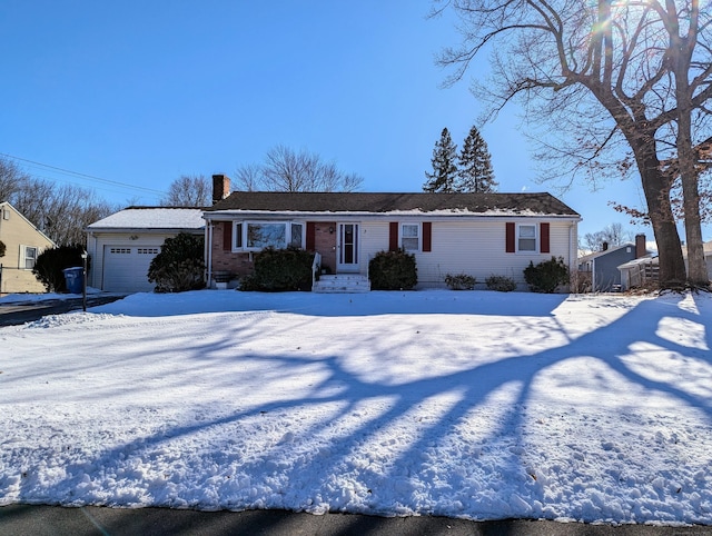 single story home featuring a garage