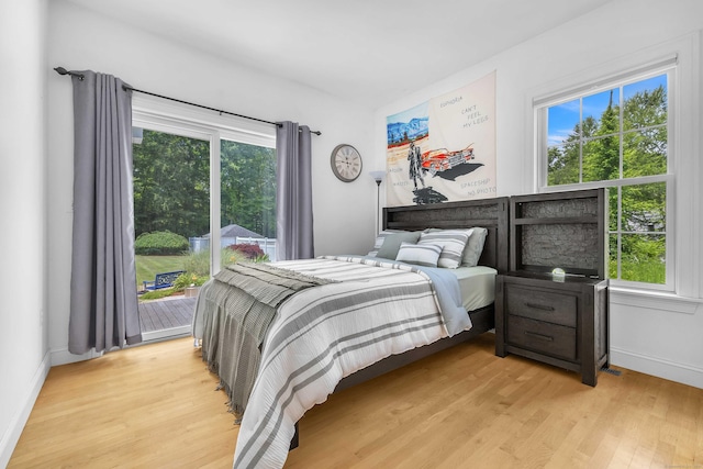 155 W Rd, East Haddam, CT 06420 - bedroom with light wood-style flooring and multiple windows