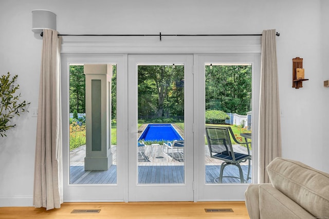 155 W Rd, East Haddam, CT 06420 - doorway to outside featuring plenty of natural light and wood finished floors