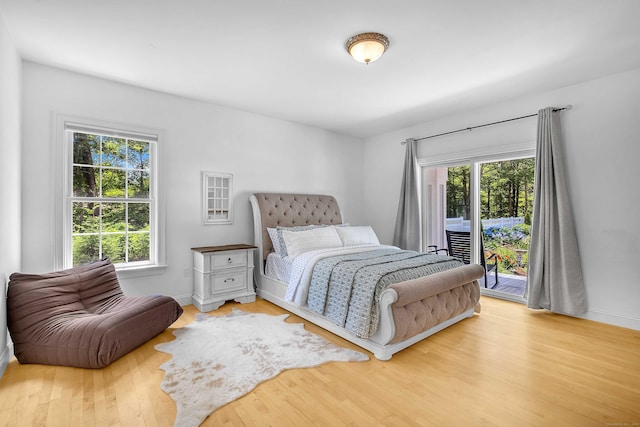 155 W Rd, East Haddam, CT 06420 - bedroom featuring access to exterior and wood finished floors