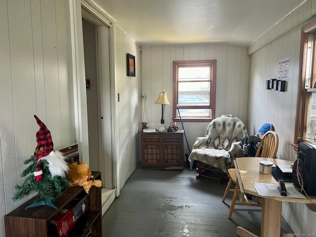 sitting room with wood-type flooring