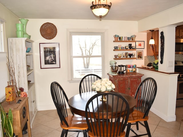 dining room featuring light tile patterned flooring