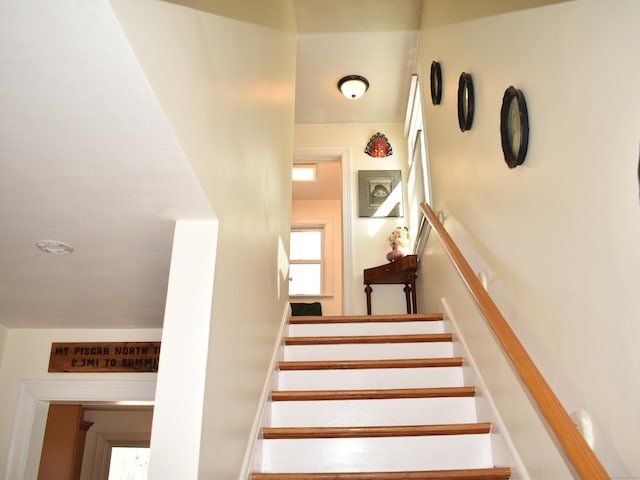 stairs with a wealth of natural light