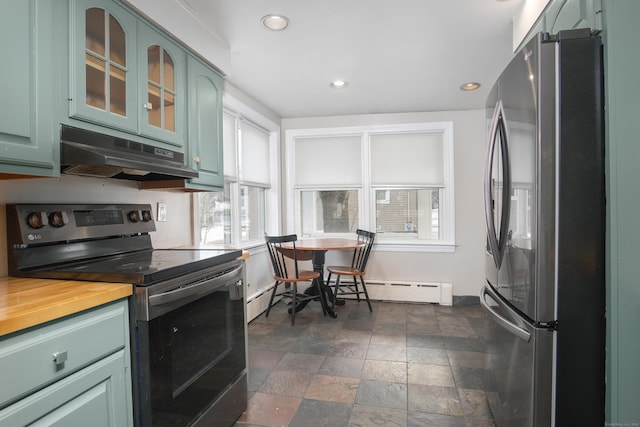 kitchen with a baseboard radiator and appliances with stainless steel finishes