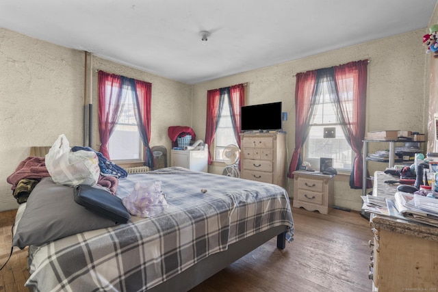 bedroom featuring hardwood / wood-style floors