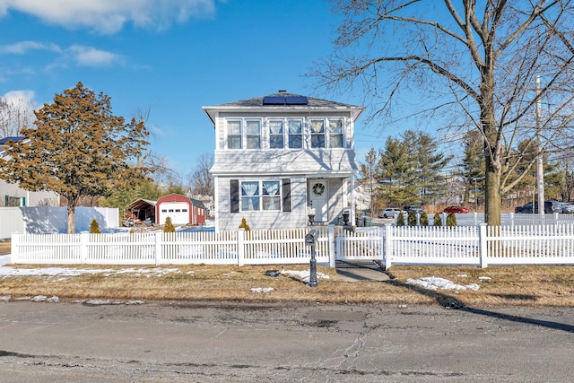 view of front of home featuring solar panels